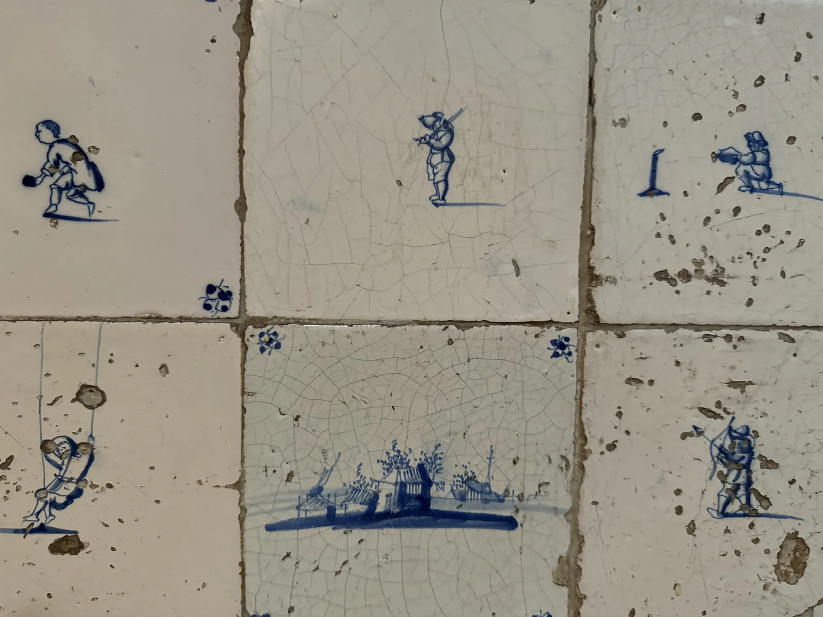Delft Tiles with Rural Scenes and Games