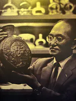 Yoshitaro Amano Admiring Peruvian Antiques