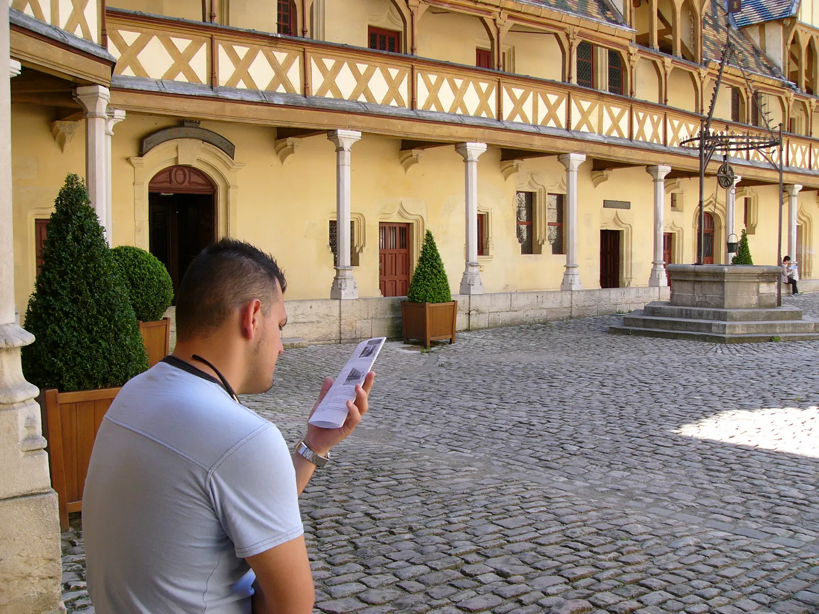 Luis in the Courtyard of the Hôtel-Dieu (Beaune)