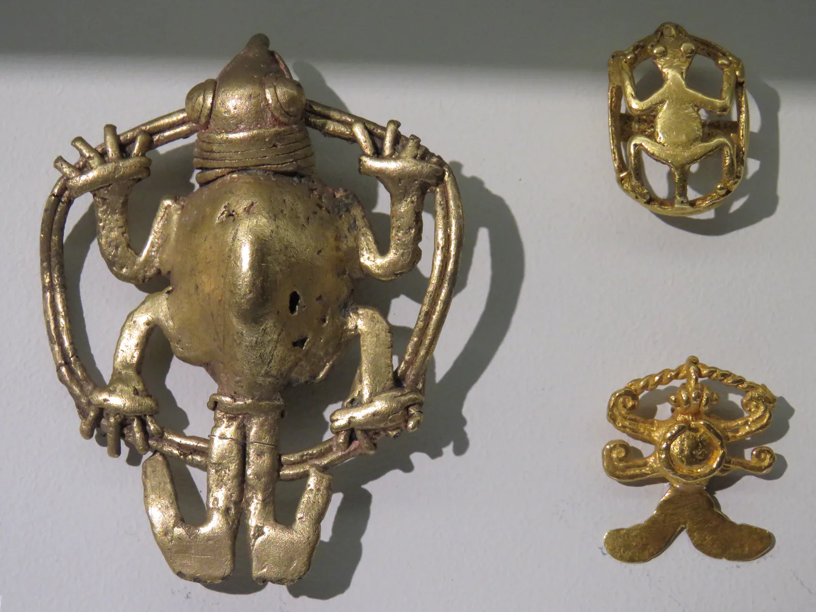 Frog and Anthropomorphic Pendants