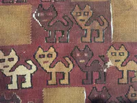 Textile with Stylized Feline Designs