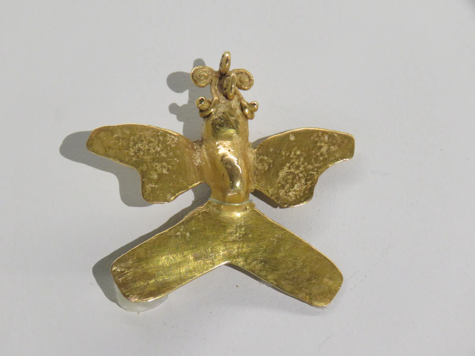 ディキス文化の翼を持つ生物ペンダント