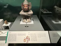 Pulque Deity with Yacametztli Ornament