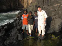 Max with Local Youth at the Volcanic Coast
