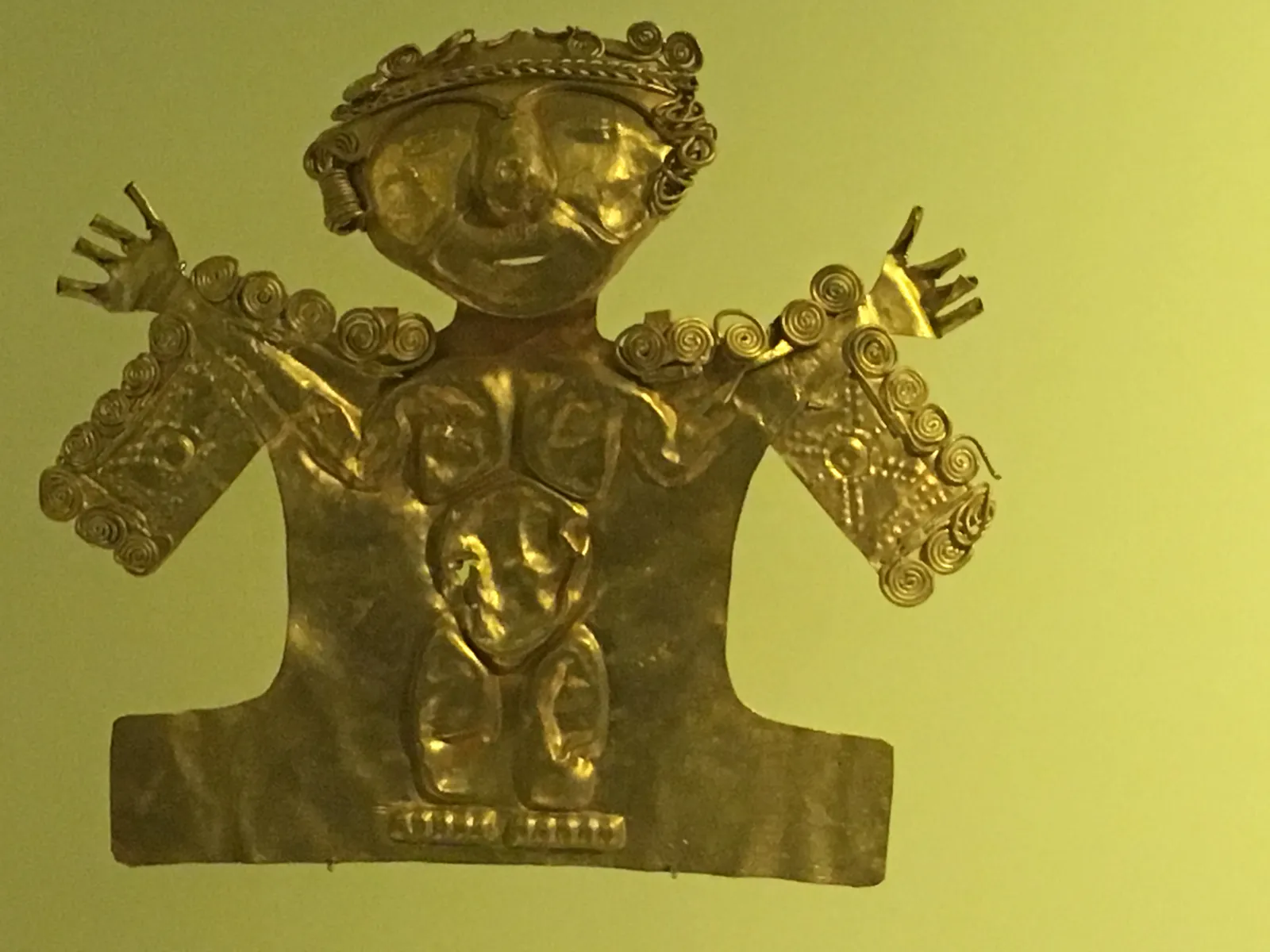 Figure with Raised Arms