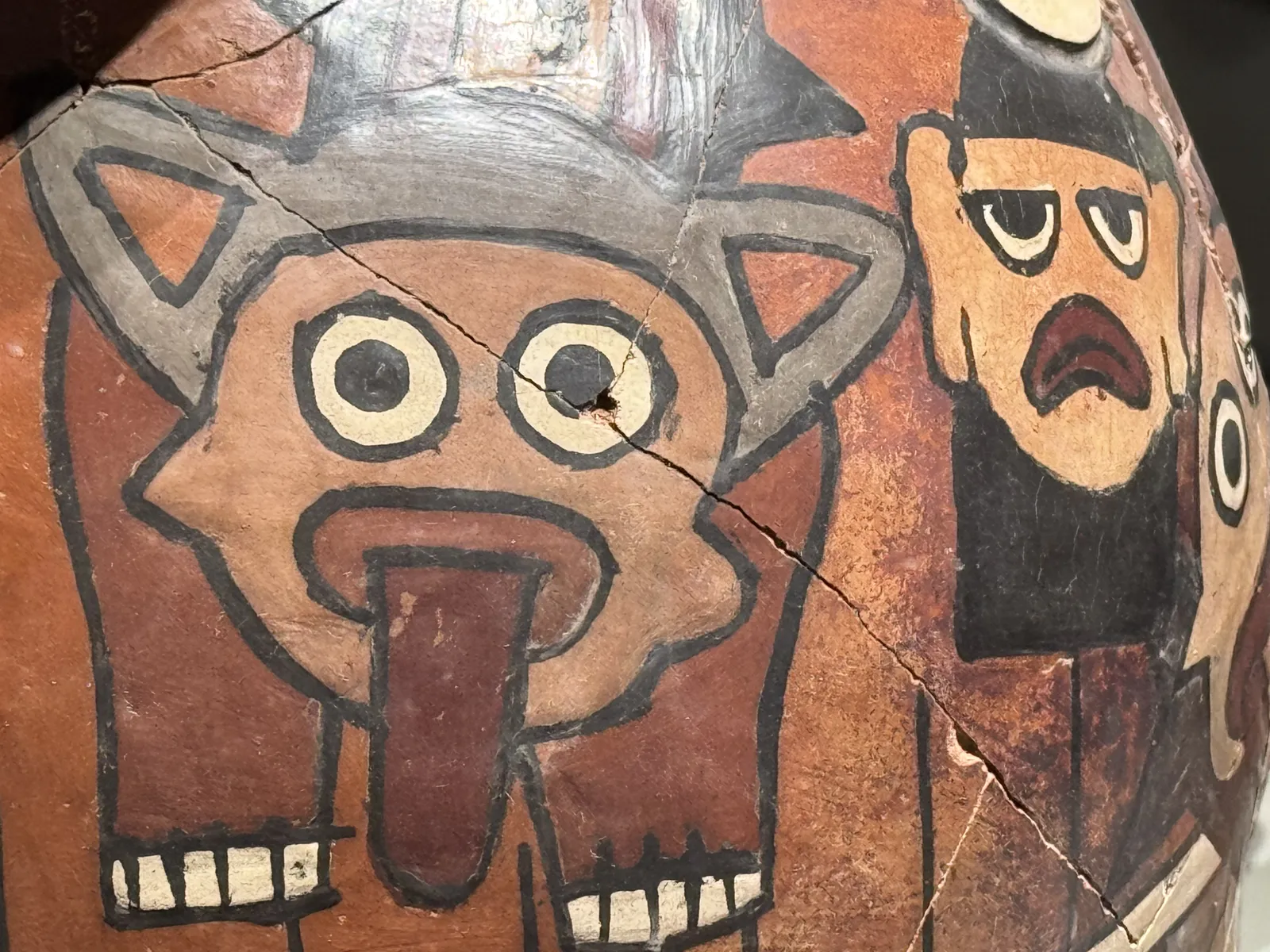 Nasca Ceramic Art with Feline and Human Figures