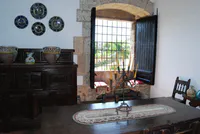 Colonial Dining Room with Majolica and Wrought Iron