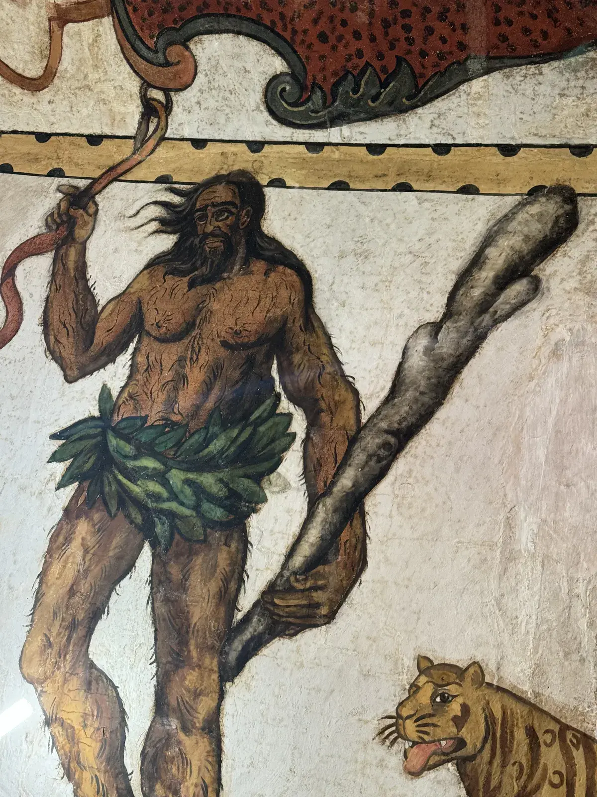 Homme sauvage avec massue