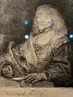 Man at a Desk Wearing a Chain