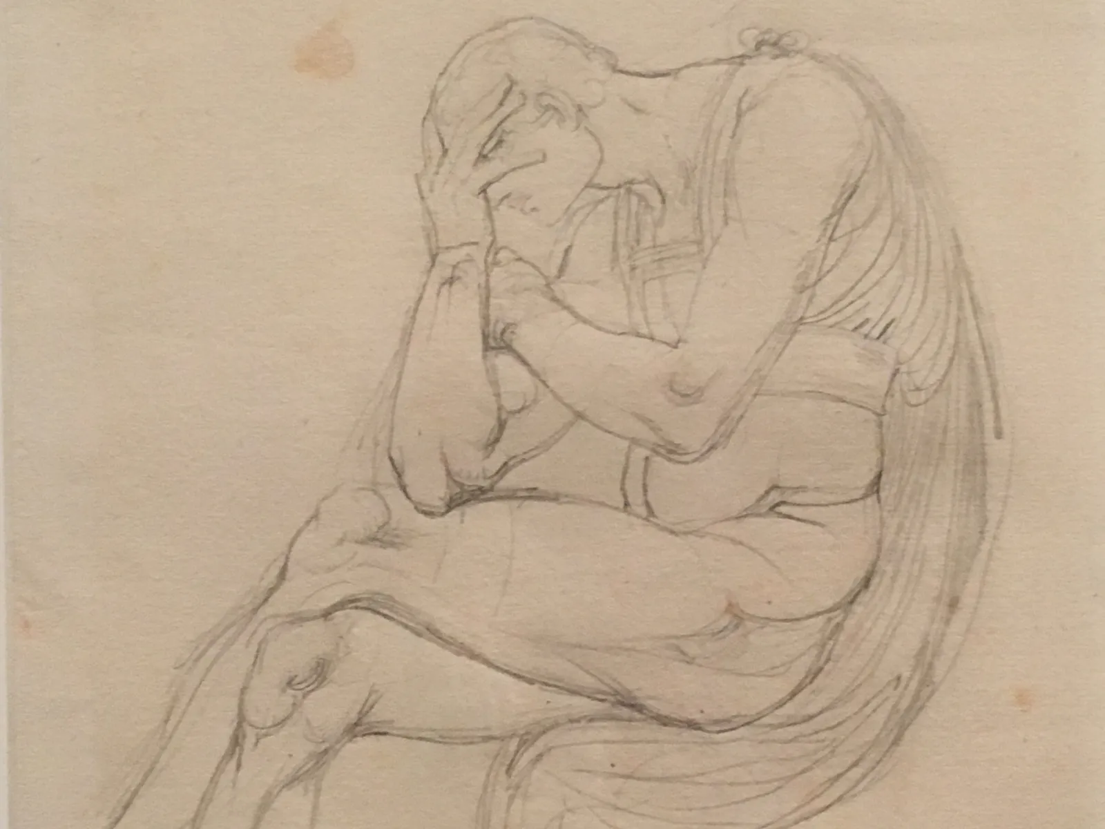 Young Man Hiding Face in Hand