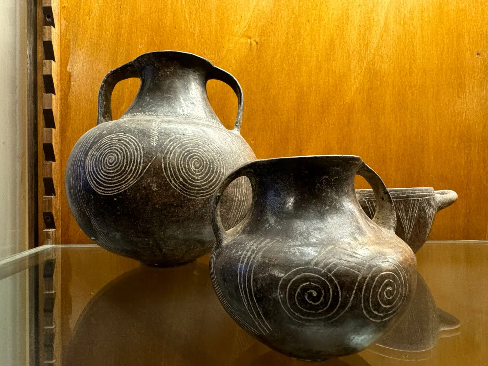 Etruscan Ceramic Vessels with Spiral Motifs