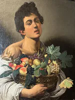 Boy with a Basket of Fruit